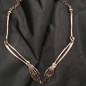 Wildfox Rose Gold plated skeleton hands necklace